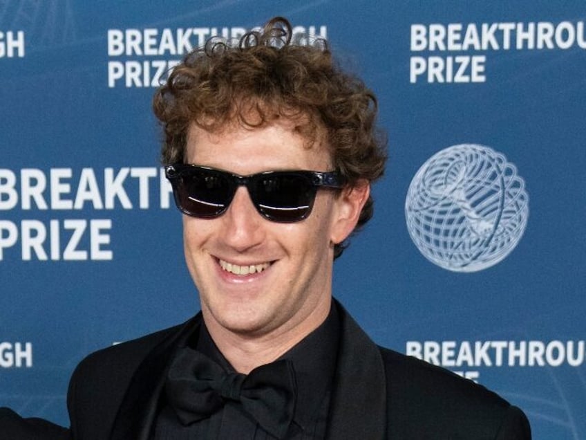 Mark Zuckerberg looking happy in his shades