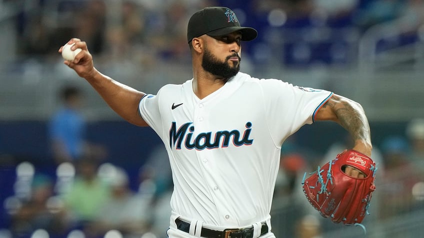 marlins shut down reigning cy young award winner with arm injury as wild card push continues