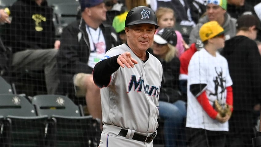 marlins third base coach fractures leg after getting hit by foul ball