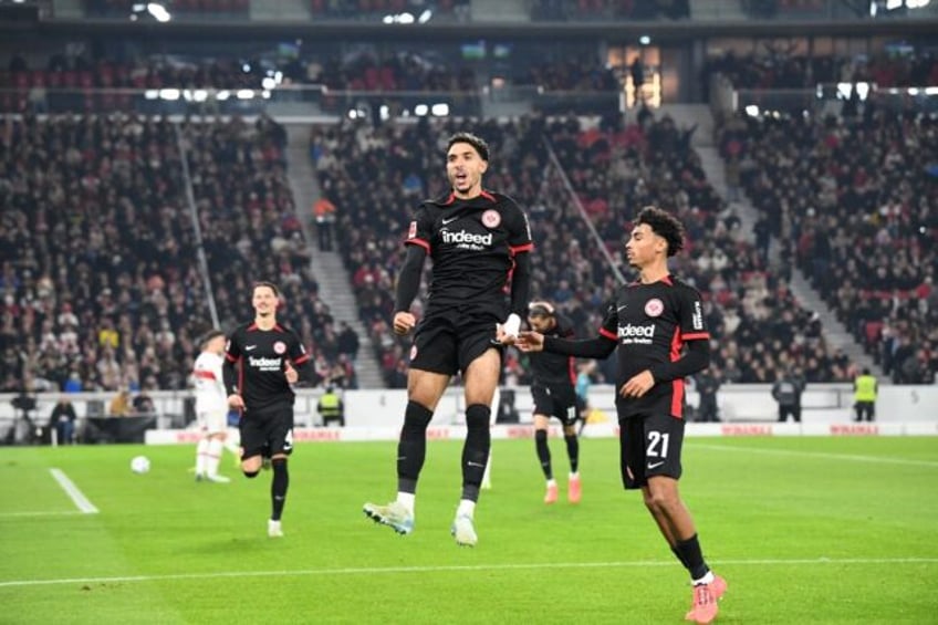 Omar Marmoush (C), seen here celebrating after scoring against Stuttgart earlier in Novemb