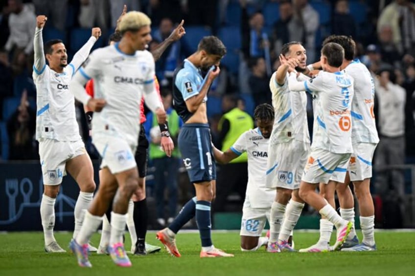 Marseille beat Le Havre 3-1 on Saturday to seal Champions League qualification with Mason