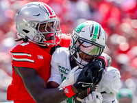 Marshall football player gets into intense scuffle with ball boy after game