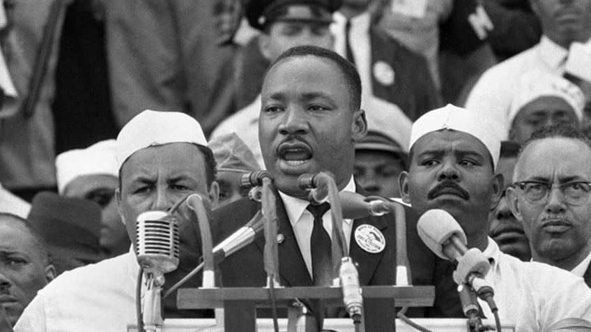 Black and white photograph of Martin Luther King Jr. speaking