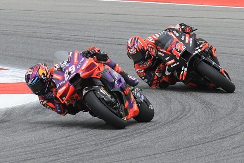 Ducati-Primac Spanish rider Jorge Martin leads Maverick Vinales in the Portuguese MotoGP