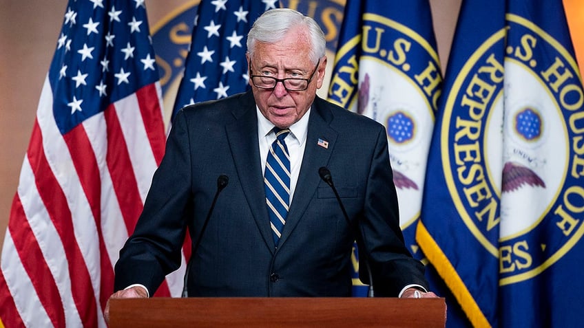 Hoyer at a press conference