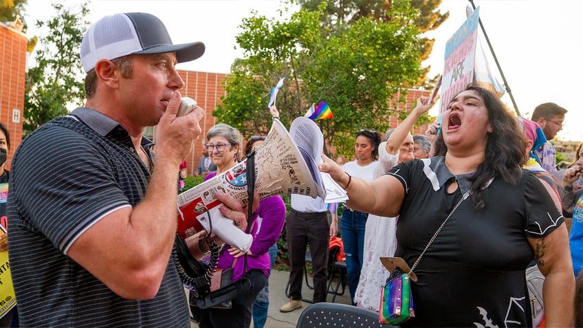 photo of protesters outside Orange Unified school board meeting