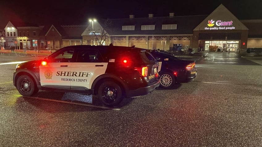 Police car at murder scene