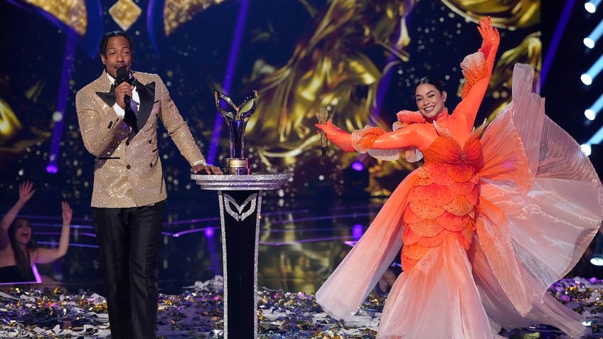 Nick Cannon and Vanessa Hudgens on "The Masked Singer" 