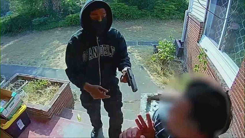 masked suspects in seattle tase rob man at gunpoint outside home video shows