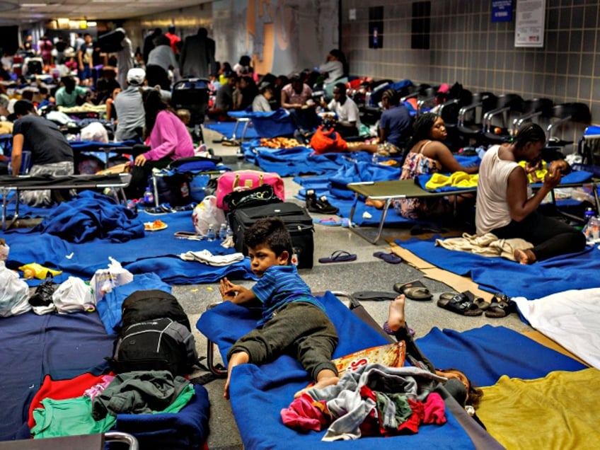 massachusetts governor demands help from biden admin as dozens of migrant families camp out in boston airport