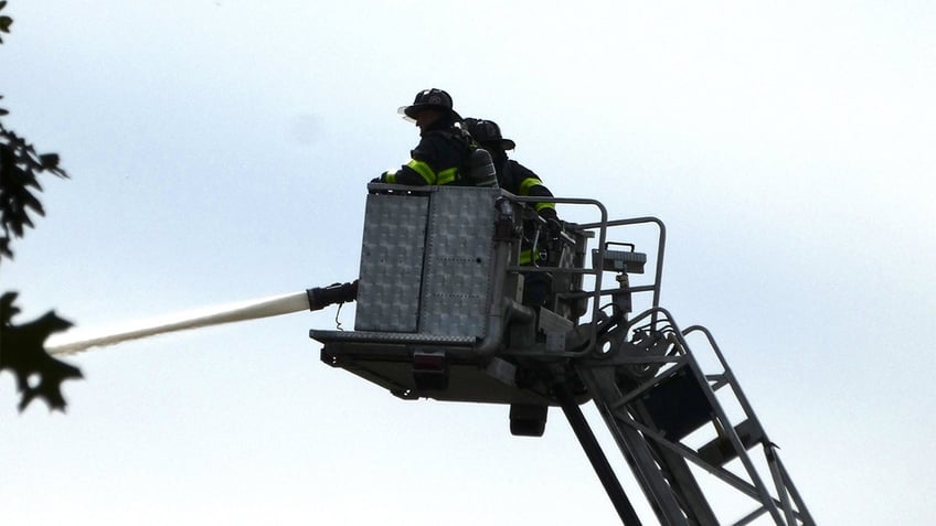 massachusetts junkyard blaze leaves one hospitalized in two alarm fire