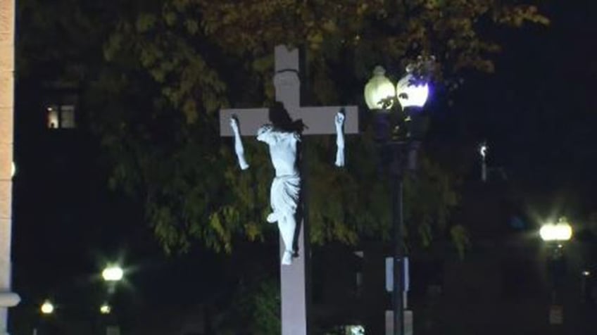 massachusetts man allegedly broke arms off crucifix outside boston cathedral after swinging from it