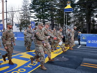 Massachusetts National Guard members kick off the 128th Boston Marathon