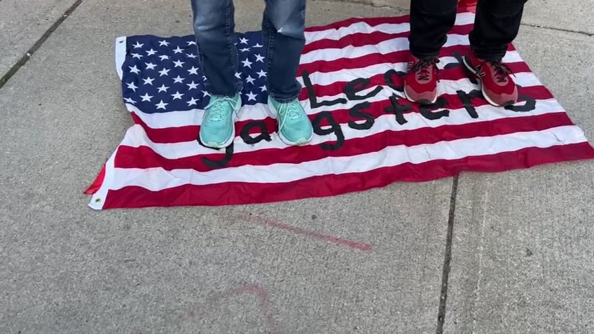 massachusetts pro palestinian protestors desecrate us flag call america legit gangsters