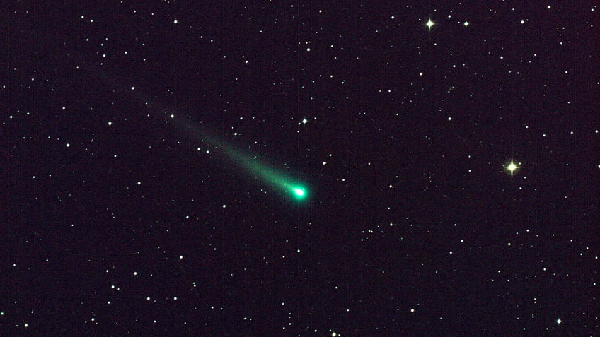 massive devil comet with ice volcano and horns to light up earth skies