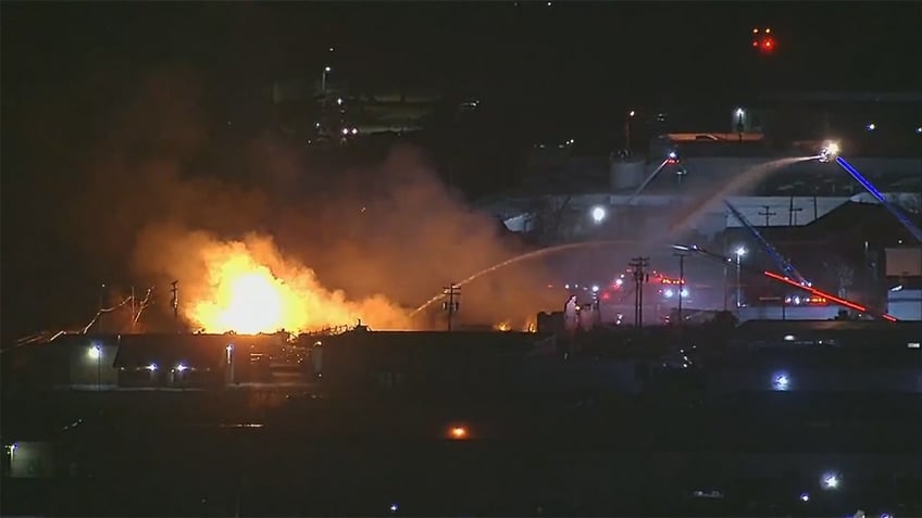 Firefighters tackling an industrial blaze