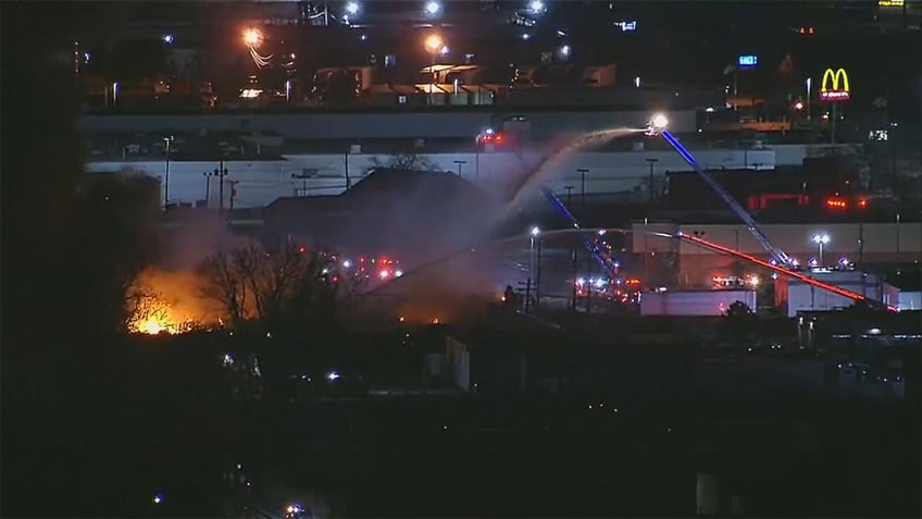 Firefighters tackling an industrial blaze