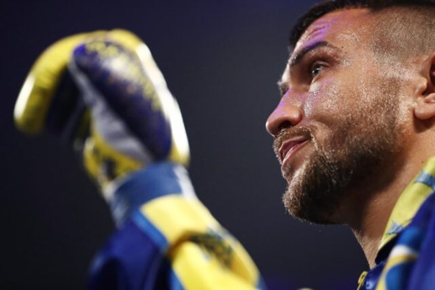 Ukraine's Vasiliy Lomachenko won the vacant IBF lightweight title by knocking out Australi