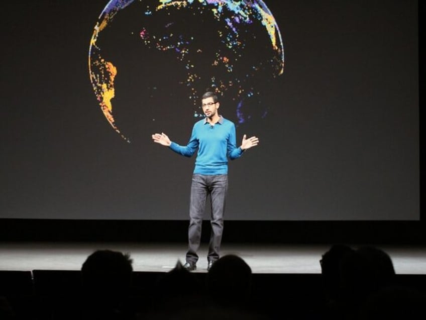 Sundar Pichai in front of a globe