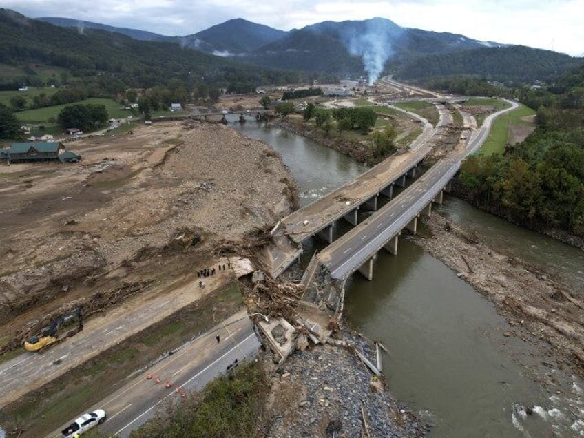 A bridge along Interstate 26 is destroyed in the aftermath of Hurricane Helene Friday, Oct