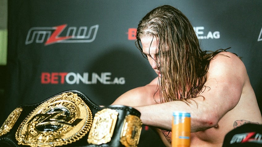 Matt Riddle with the belt