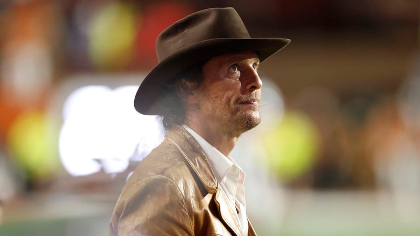 Matthew McConaughey attends a Texas game