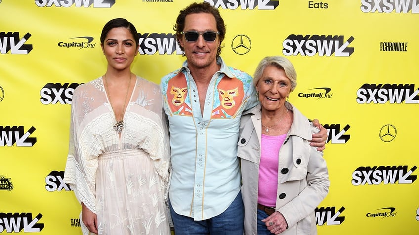 Matthew McConaughey with his mom Kay and his wife Camila Alves.