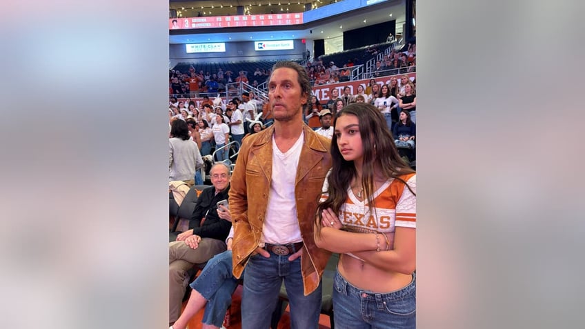 Matthew McConaughey Cheers with Daughter Vida at Women’s Basketball Game in Austin