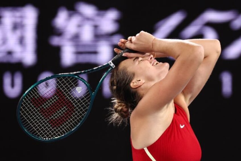 Aryna Sabalenka celebrates winning her second straight Australian Open crown