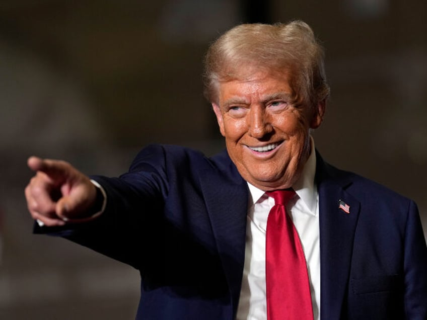 Republican presidential nominee former President Donald Trump arrives for a campaign event