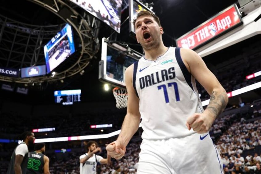 Luka Doncic of the Dallas Mavericks celebrates during the fourth quarter of the Mavs' seri