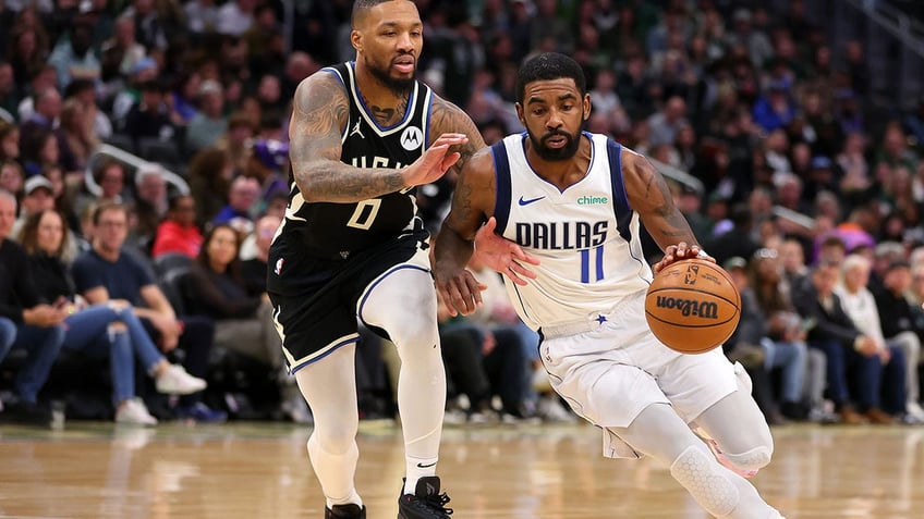 mavericks kyrie irving wears keffiyeh to postgame press conference