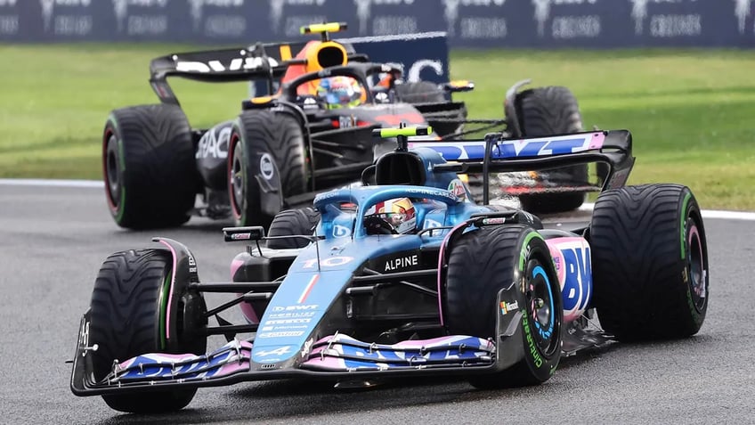 max verstappen takes home victory at rainy belgian grand prix