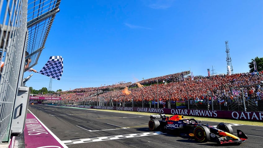 max verstappen wins hungarian grand prix to give red bull its 12th straight win