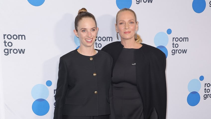 Maya Hawke and Uma Thurman posing together