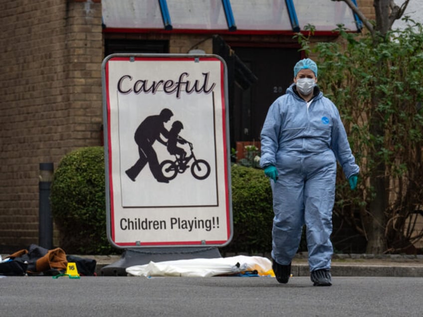 SOUTHWARK, ENGLAND - JANUARY 30: Police and forensics officers work at the scene of a shooting on January 30, 2024 in Southwark, England. A man died in the early hours of this morning after being shot by armed police officers responding to calls for help from occupants of a house …