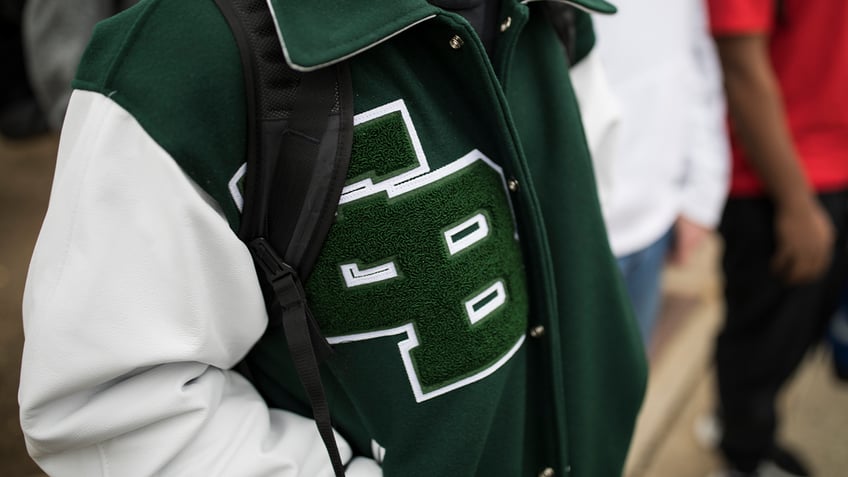 Students walk from the campus of East Brunswick High School after the school day on February 22, 2018, in East Brunswick, New Jersey.