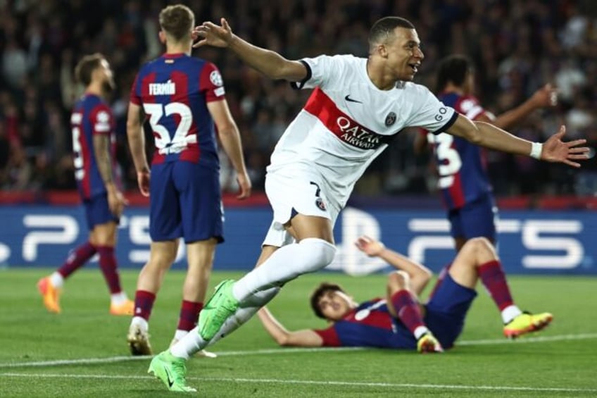 Paris Saint-Germain's French forward Kylian Mbappe netted twice against Barcelona at Montj