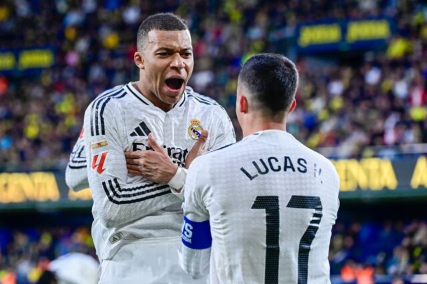 Real Madrid's French forward Kylian Mbappe celebrates his second goal at Villarreal on Sat