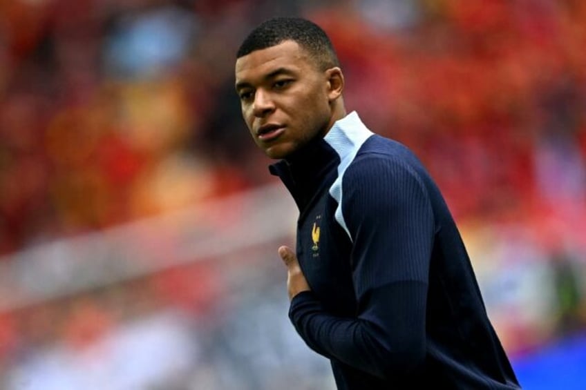 Kylian Mbappe has called on French voters to turn out and vote against the far-right Natio