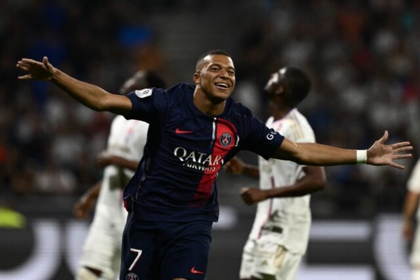 mbappe scores twice as ruthless psg hammer lyon