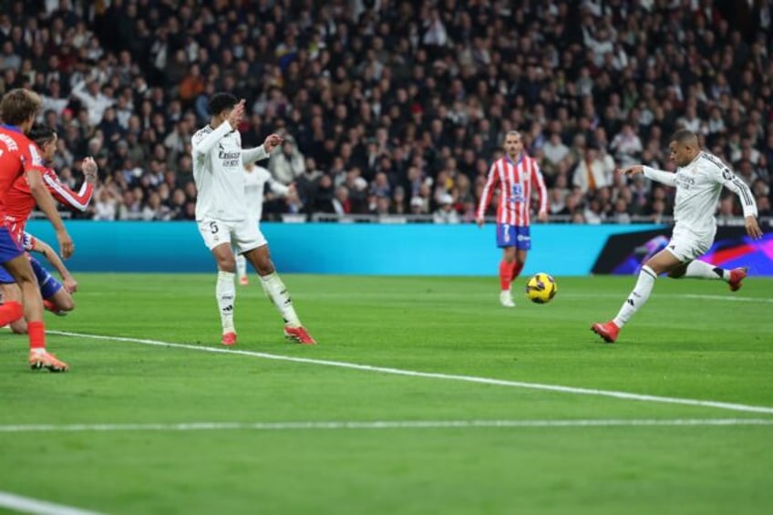 Real Madrid's Kylian Mbappe levels for his side in the derby clash against Atletico Madrid