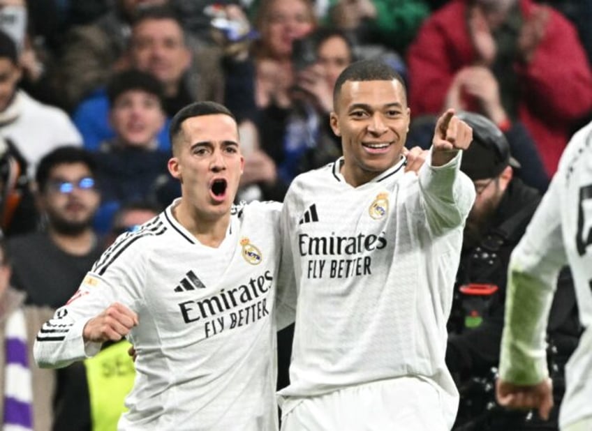 Real Madrid's French forward Kylian Mbappe celebrates scoring his team's third goal in the