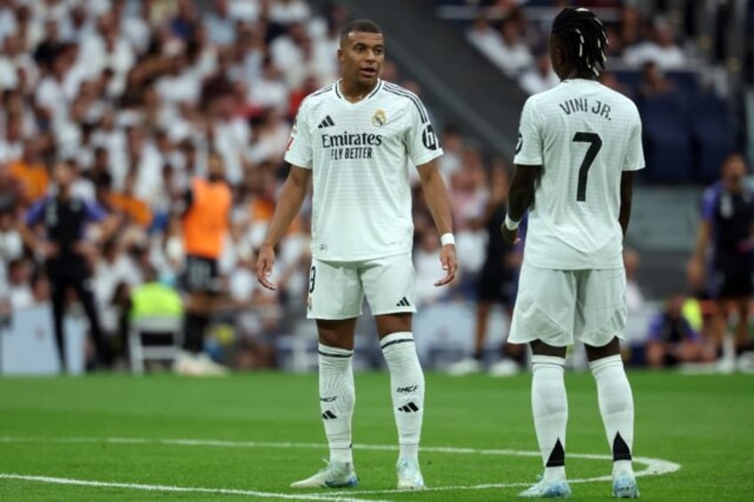 Real Madrid coach Carlo Ancelotti said strikers Kylian Mbappe (L) and Vinicius Junior (R)