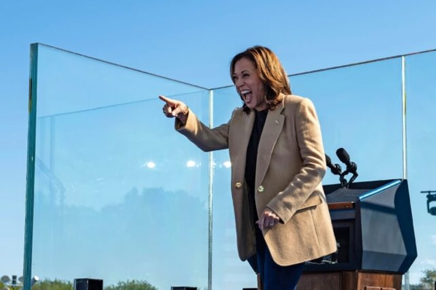 US Vice President and Democratic presidential candidate Kamala Harris gestures as she arri