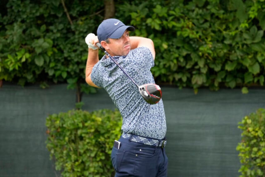 mcilroy harman share bmw championship lead on a soft olympia fields