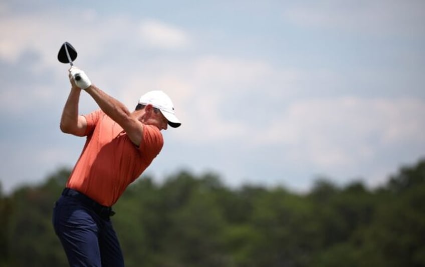World number three Rory McIlroy of Northern Ireland shared the lead when he teed off in Fr