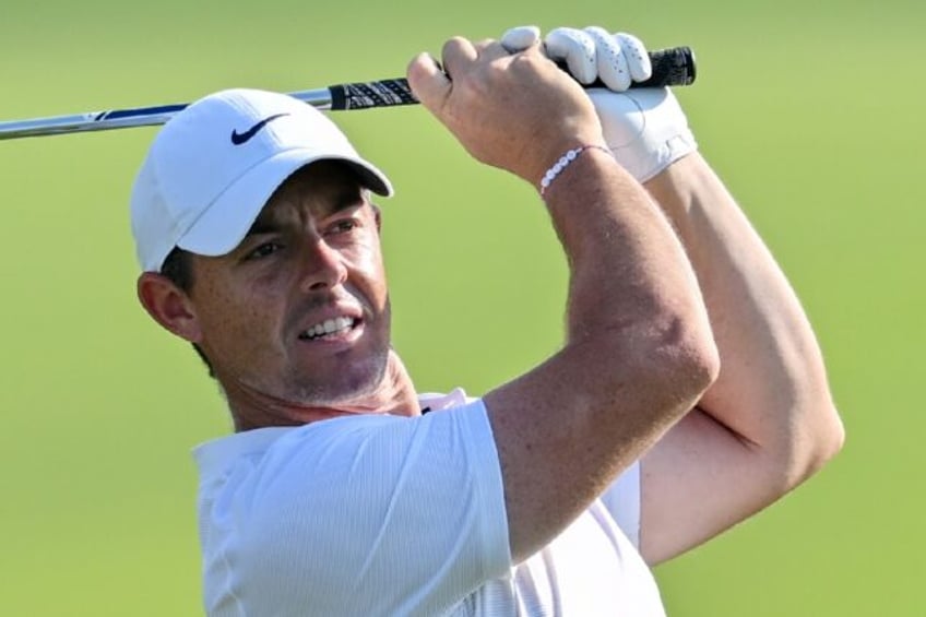 Rory McIlroy of Northern Ireland says PGA Tour titles are cheapened when many of the world's top players are banned after jumping to rival LIV Golf and merging the tours is more important than punishing defectors who seek a return