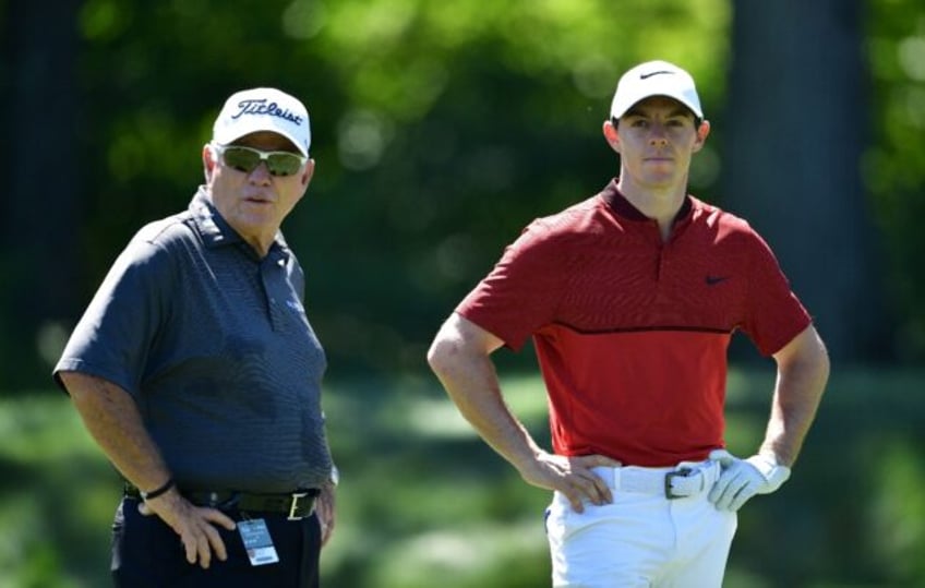 Four-time major winner Rory McIlroy, right, made a visit to veteran coach Butch Harmon, le