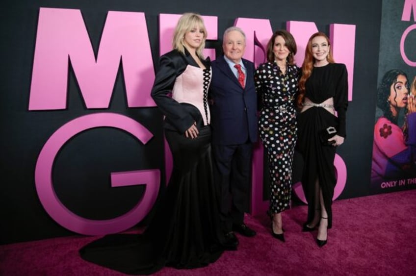 (L-R) Singer Renee Rapp, producer Lorne Michaels, playwright Tina Fey and actress Lindsay Lohan arrive for the premiere of "Mean Girls" in New York on January 8, 2024